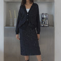 KOUTURE KNITTED SET 2 Cardigan : Button Closure. Full Sleeves. Rhinestone Embellishment. Skirt : Maxi Length. Back Slit. Comfort Stretch. كارديجان: إغلاق بأزرار. أكمام طويلة. مزين بأحجار الراين. تنورة: ماكسي. فتحة خلفية. قماش مريح ومطاط