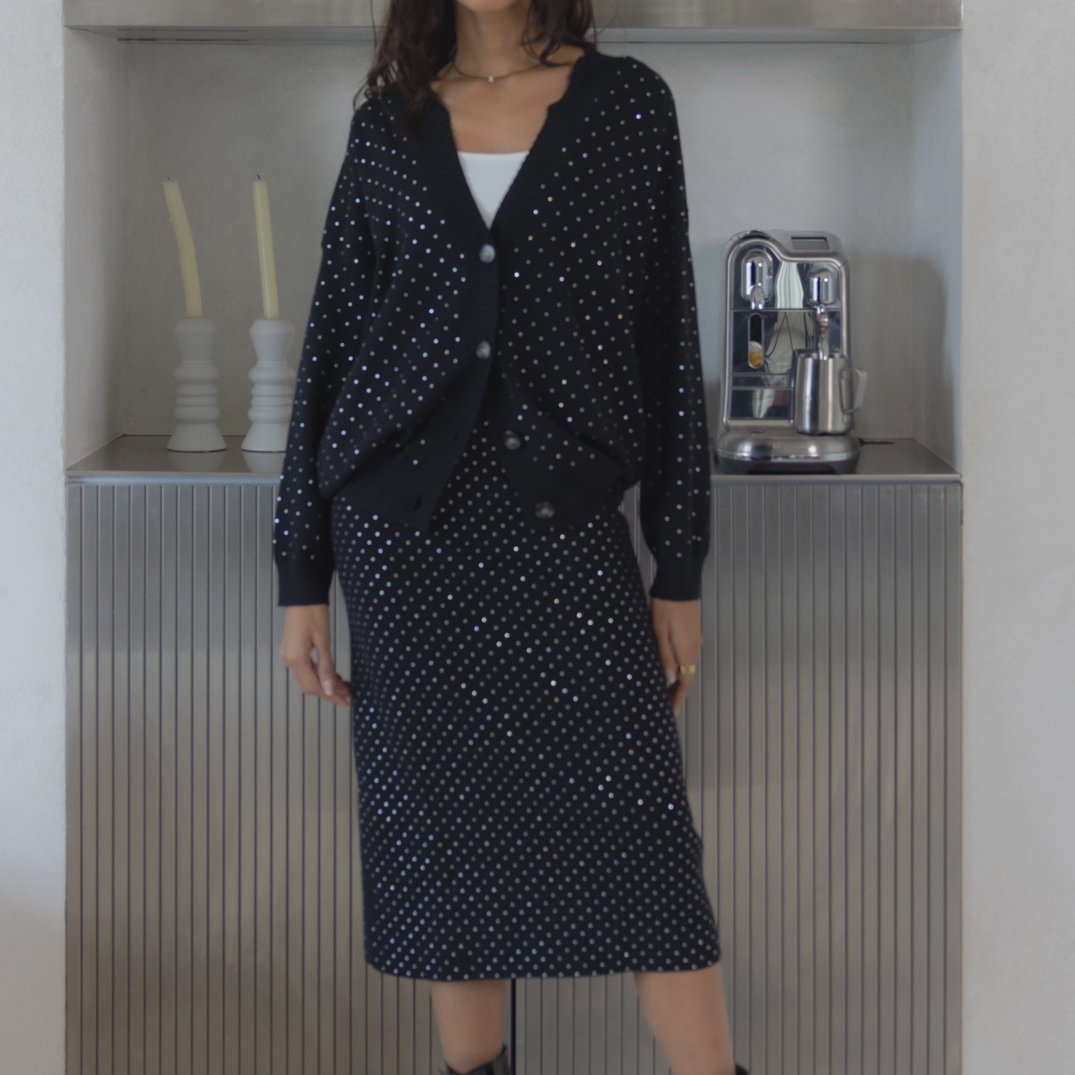 KOUTURE KNITTED SET 2 Cardigan : Button Closure. Full Sleeves. Rhinestone Embellishment. Skirt : Maxi Length. Back Slit. Comfort Stretch. كارديجان: إغلاق بأزرار. أكمام طويلة. مزين بأحجار الراين. تنورة: ماكسي. فتحة خلفية. قماش مريح ومطاط