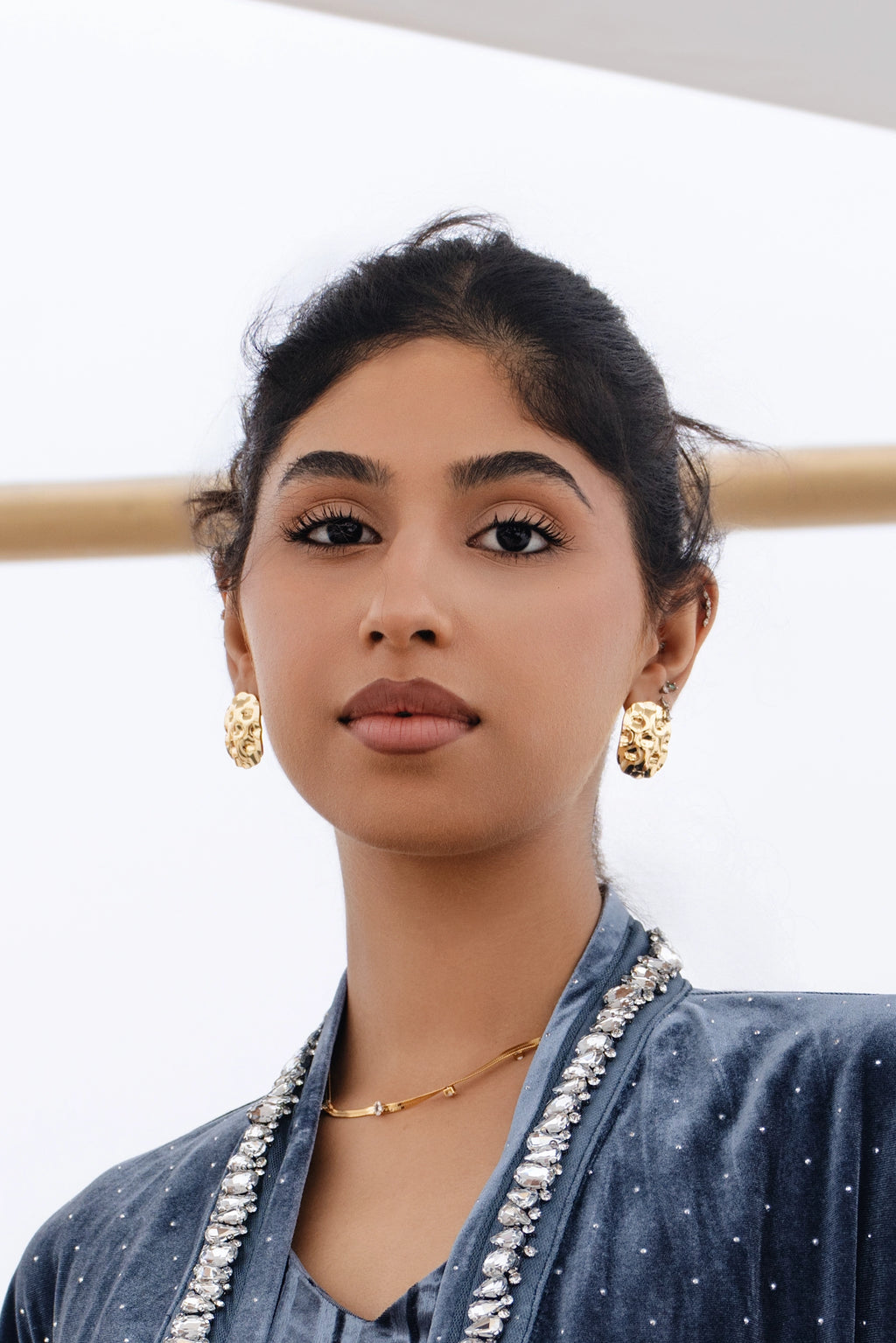 GRIDLOCK EARRING قرط على شكل قفل شبكي.