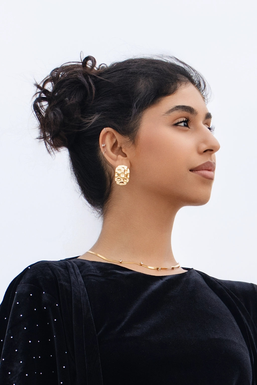 GRIDLOCK EARRING قرط على شكل قفل شبكي.